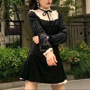 Goth, rockstar, black velvet dress.